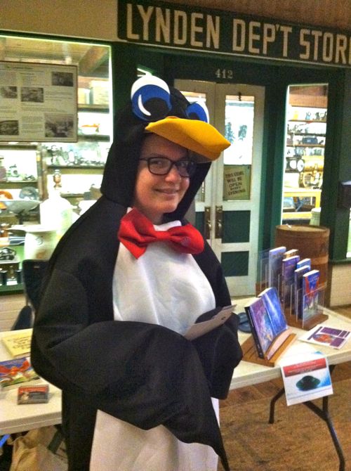 a penguin peruses Purtill's prose